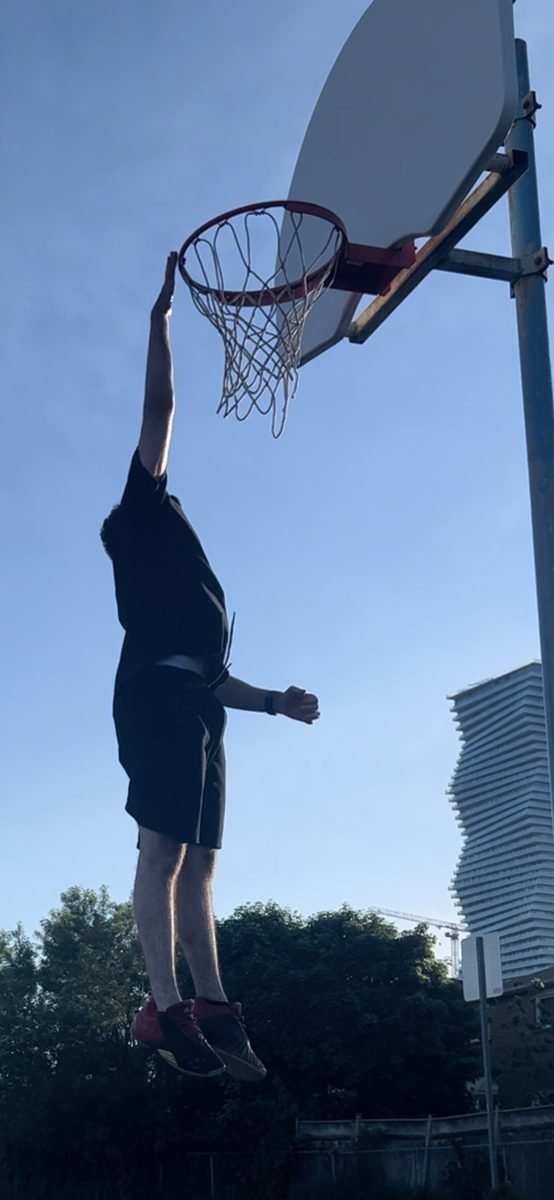 Ahmad Abu-Hattab playing basketball in Toronto — McMaster Engineering Physics student, athlete, and entrepreneur